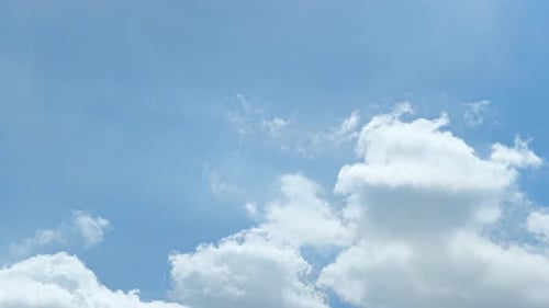 Clouds Drifting Across a Beautiful Blue Sky