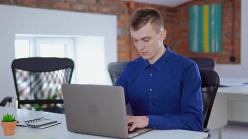 Caucasian Employee Male at Workplace
