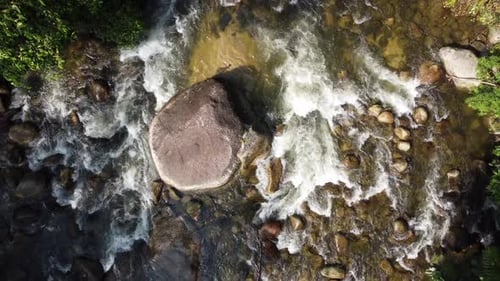 Water stream flow over the rock at Sungai Sedim forest