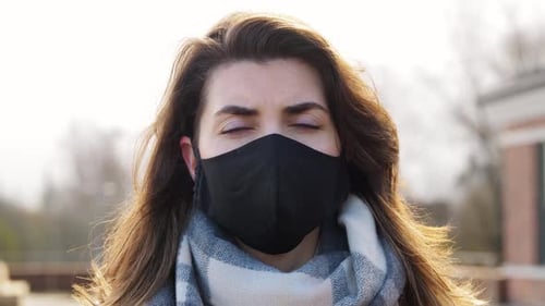 Woman Wearing Protective Reusable Barrier Mask