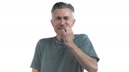 Man Reacting to Disgusting Unpleasantness