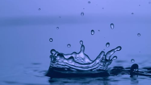 Water Droplets Splashing with Blue Background