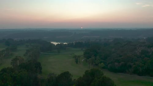 Aerial View. Golf Course at Sunset.