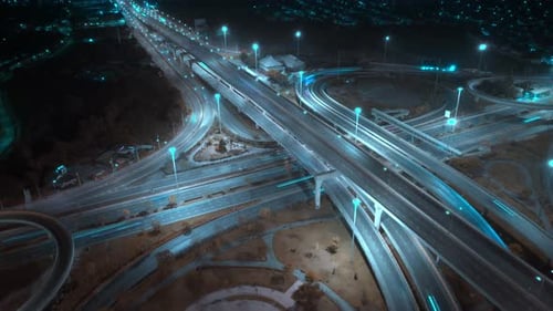 4K : Time lapse Aerial view and top view of traffic on city. Expressway with car lots