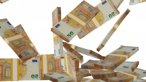 Many wads of money falling on table. 50 Euro banknotes. Stacks of money.