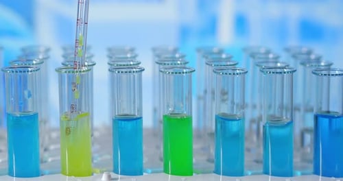 Colorful Liquids Filling Test Tubes in Laboratory Close Up
