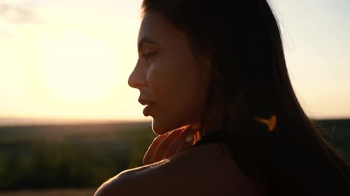 Woman with Long Hair in Golden Hour Light