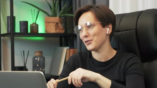 Young Woman Talking During a Video Call at Home