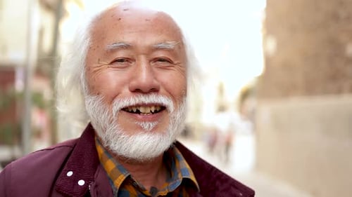 Happy Senior Man Smiles Close Up Portrait