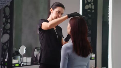 Eyebrow Shaping Treatment at a Beauty Salon
