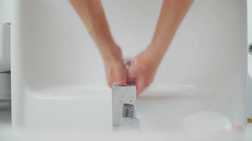 Female Hands Washing In Basin. Hygiene during coronavirus. A woman washes her hands