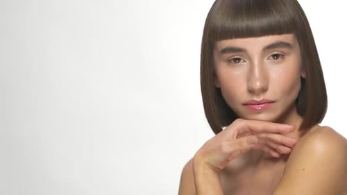 Woman Posing with Bob Haircut on White Background