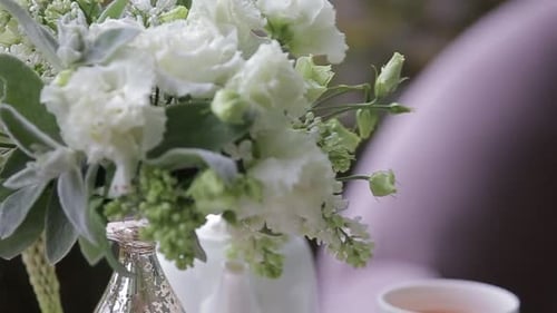 Tea Set and White Roses Bouquet Close Up