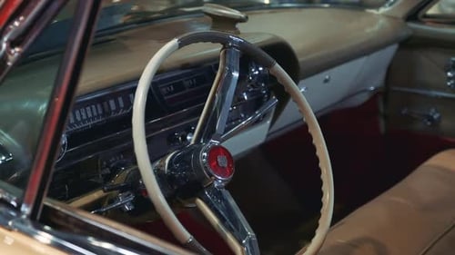 Vintage Car Interior with Chrome Steering Wheel
