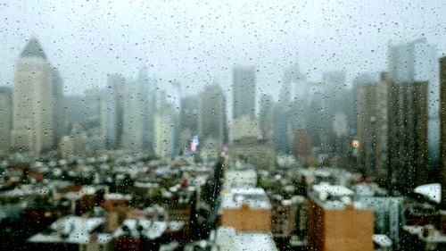 Rainy Day City View Through Window