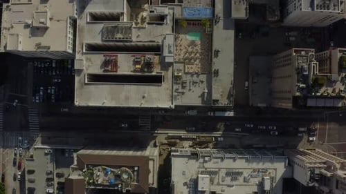 AERIAL: Birds Eye View Over Streets of Downtown Los Angeles, California with cars,Traffic and