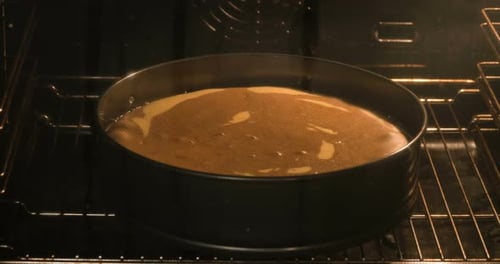 Cake Rising While Baking in the Oven