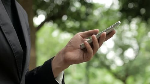 Hand Using Smart Phone in Urban Environment