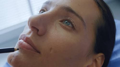 Woman Prepped for Cosmetic Procedure in Clinic