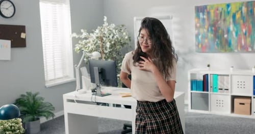 Happy Satisfied Office Worker Got Promotion She Dances Between Desks in Company Woman with Korean