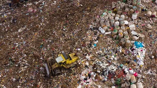 Garbage Bags and Plastic Garbage in a Landfill, Top View. Flock of Seagulls