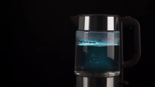 Electric Kettle Boiling Water with Blue Light