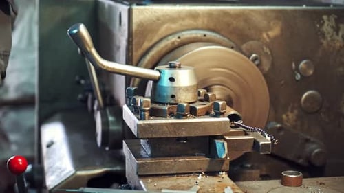 Metal Lathe Machining Metal Component in Workshop