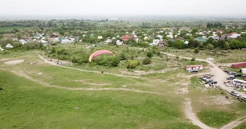 Aerial View of Paragliding in Rural Landscape
