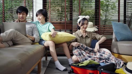 Family Packs Luggage for Upcoming Vacation