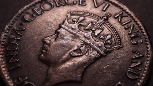 Close up of very old coin