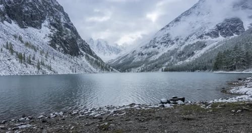 Snow Mountain Lake Timelapse at the Autumn Time. Wild Nature and Rural Mount Valley. Green Forest of