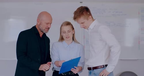 Group of Business People Discussing in Office