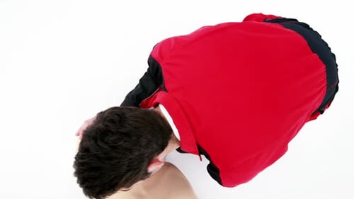 Practicing CPR on Training Mannequin Overhead