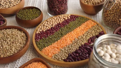Assorted Beans and Lentils in Bowls and Jars