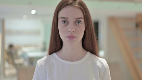 Young Woman Coughing, Close Up Indoors