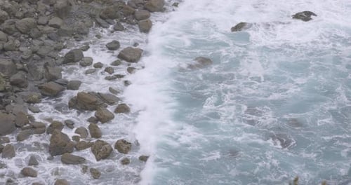 Cornwall seaside view with waves and cliffs