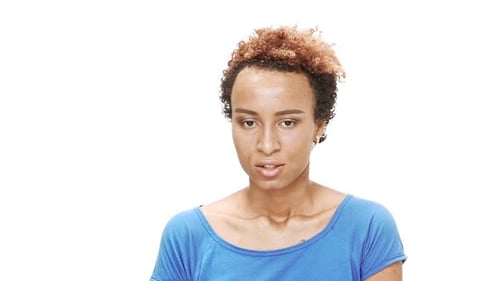 Woman Rolls Eyes in Annoyance on White Background