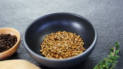 Culinary Herbs and Spices on Stone Counter