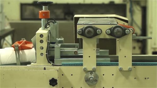 Toilet Paper Roll Packing Machine. Close Up.