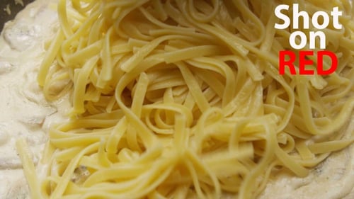 Adding Linguine to Creamy Mushroom Sauce in Pan