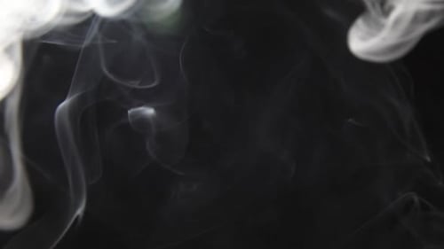 Abstract Smoke on black Background, Soft fog in slow motion on dark backdrop,