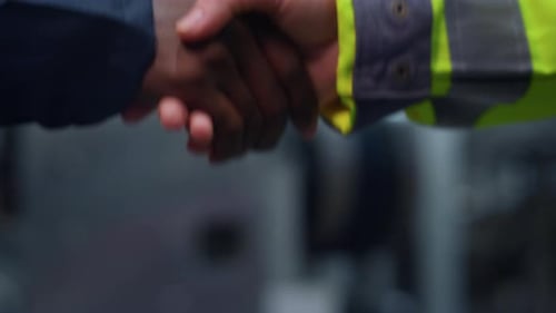 Unknown Ceo Shaking Hands at Industrial Factory Closeup