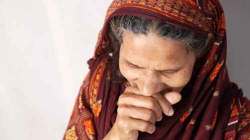 Senior Person Coughs, Covering Mouth