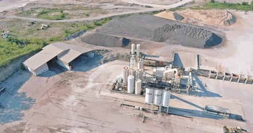 Aerial view of open cast mining panorama quarry with lots at work