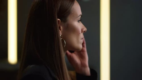 Businesswoman Calling on Smartphone in Office. Professional Talking on Cellphone