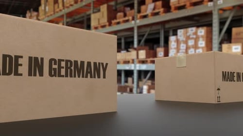 Boxes with MADE IN GERMANY Text on Conveyor