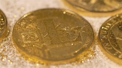 Des étincelles provenant d'une pièce créée sous forme de macro monétaire