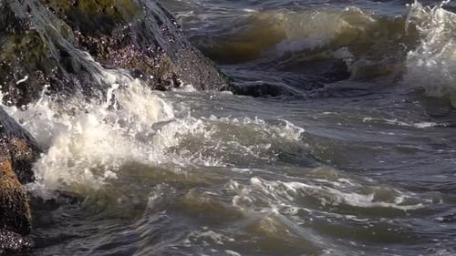 Splashing Ocean Water On Rocks