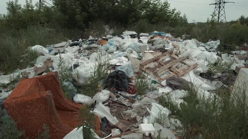 Polluted Rural Landscape with Trash Dump Site