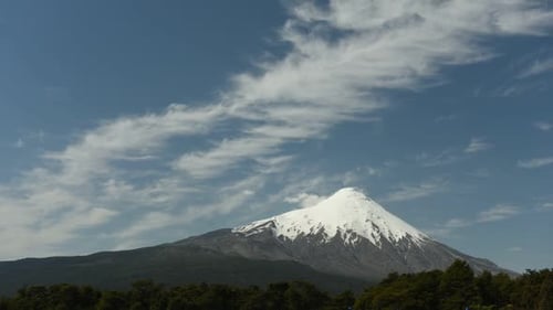 Time lapse view of wispy clouds over Osorno volcano in Chile
